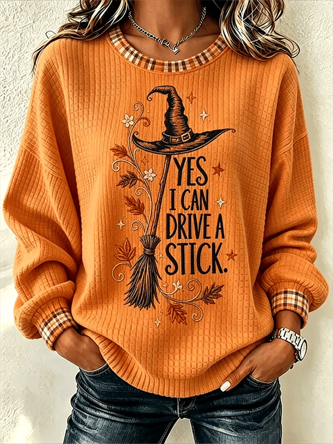 "Yes I Can Drive a Stick" Witch Sweatshirt in Orange